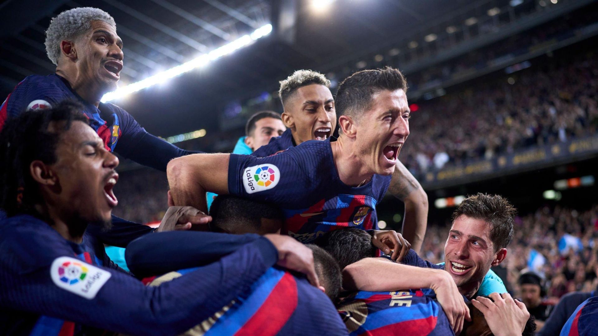Barcelona players celebrating against Real Madrid