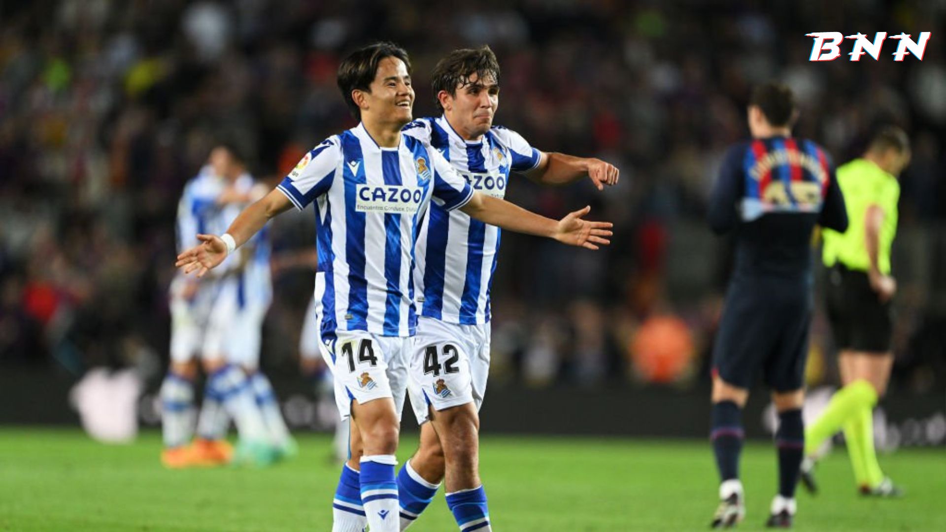 Real Sociedad players celebrating after scoring against Barcelona
