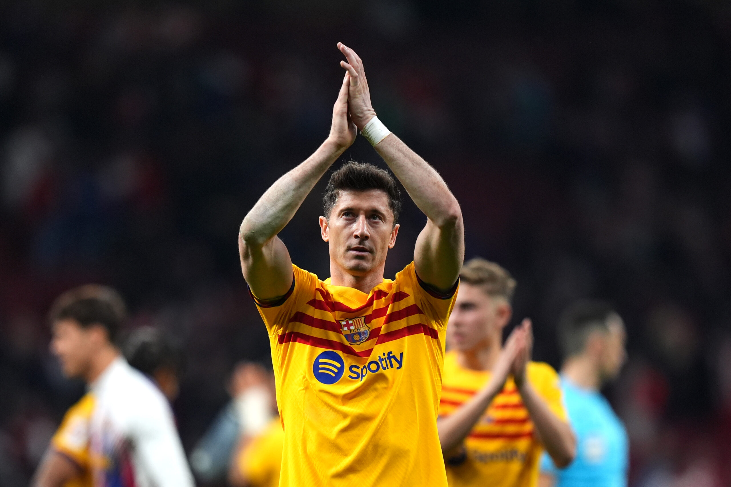MADRID, SPAIN - MARCH 17: Robert Lewandowski of FC Barcelona celebrates following the LaLiga EA Sports match between Atletico Madrid and FC Barcelona at Civitas Metropolitano Stadium on March 17, 2024 in Madrid, Spain.