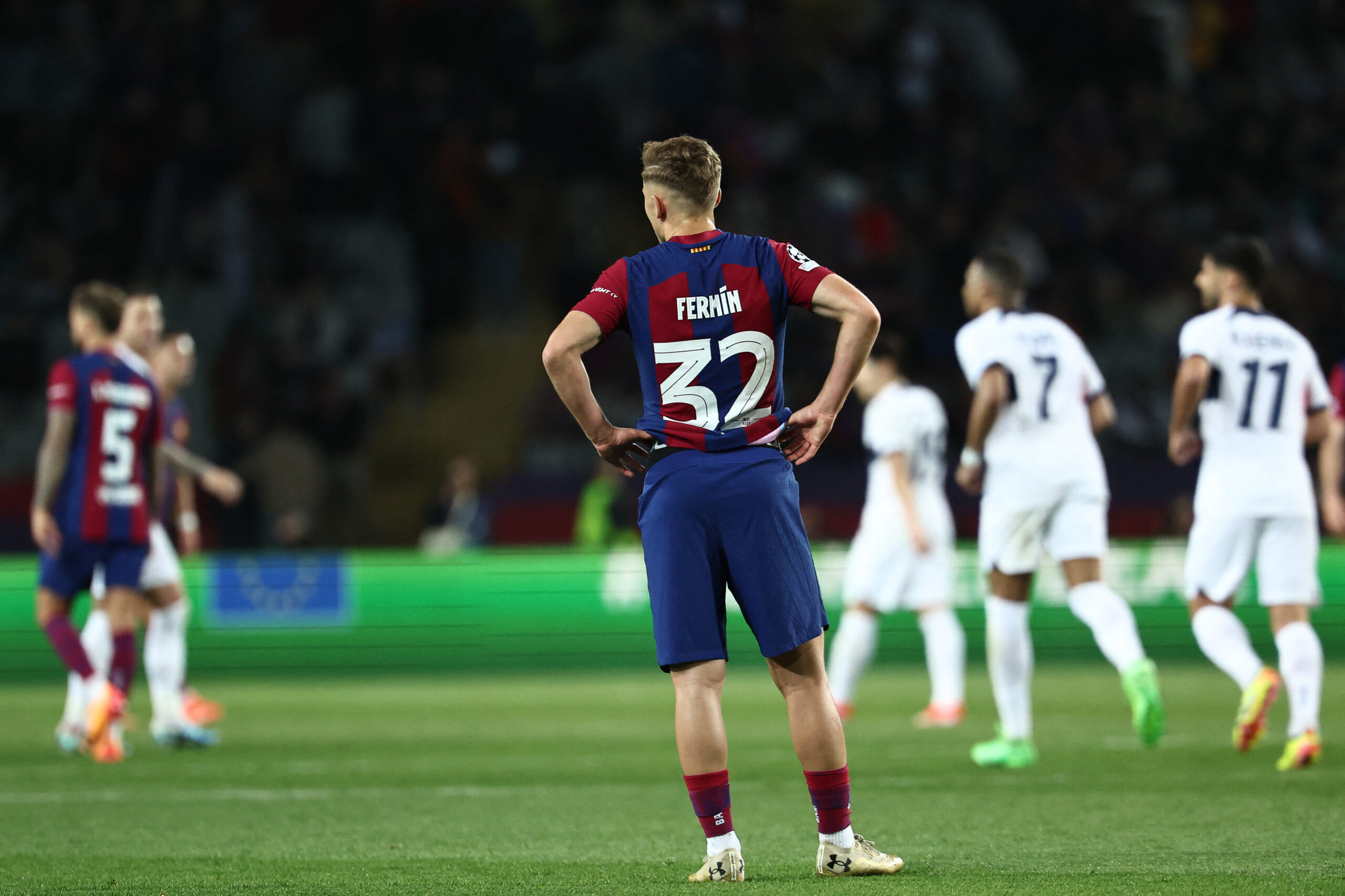 Barcelona's Spanish midfielder #32 Fermin Lopez reacts at the end of the UEFA Champions League quarter-final second leg football match between FC Barcelona and Paris SG at the Estadi Olimpic Lluis Companys in Barcelona on April 16, 2024. Paris Saint-Germain won 1-4.
