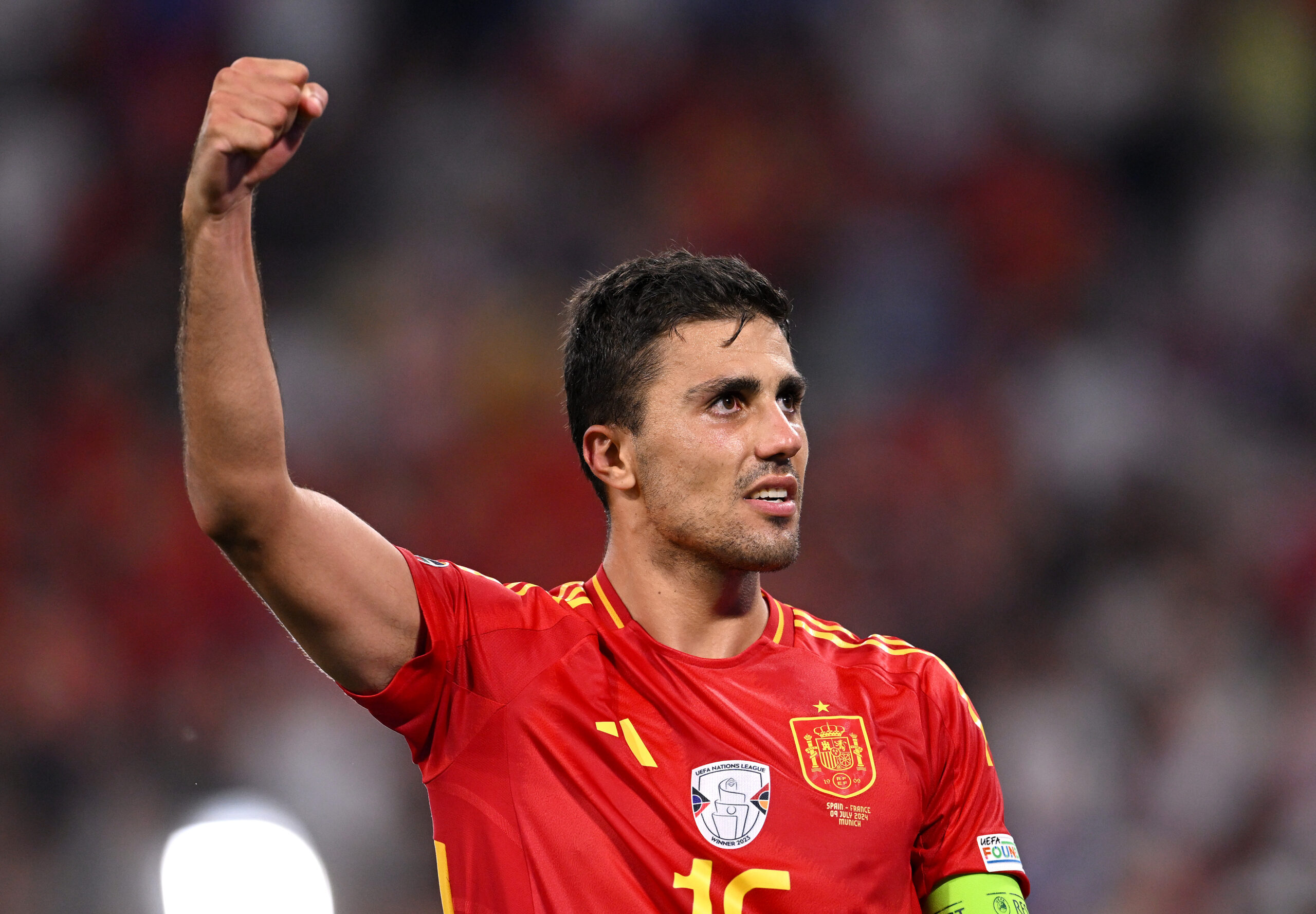 BERLIN, GERMANY - JULY 14: Rodri of Spain acknowledges the fans after victory over England in the UEFA EURO 2024 final match between Spain and England at Olympiastadion on July 14, 2024 in Berlin, Germany.
