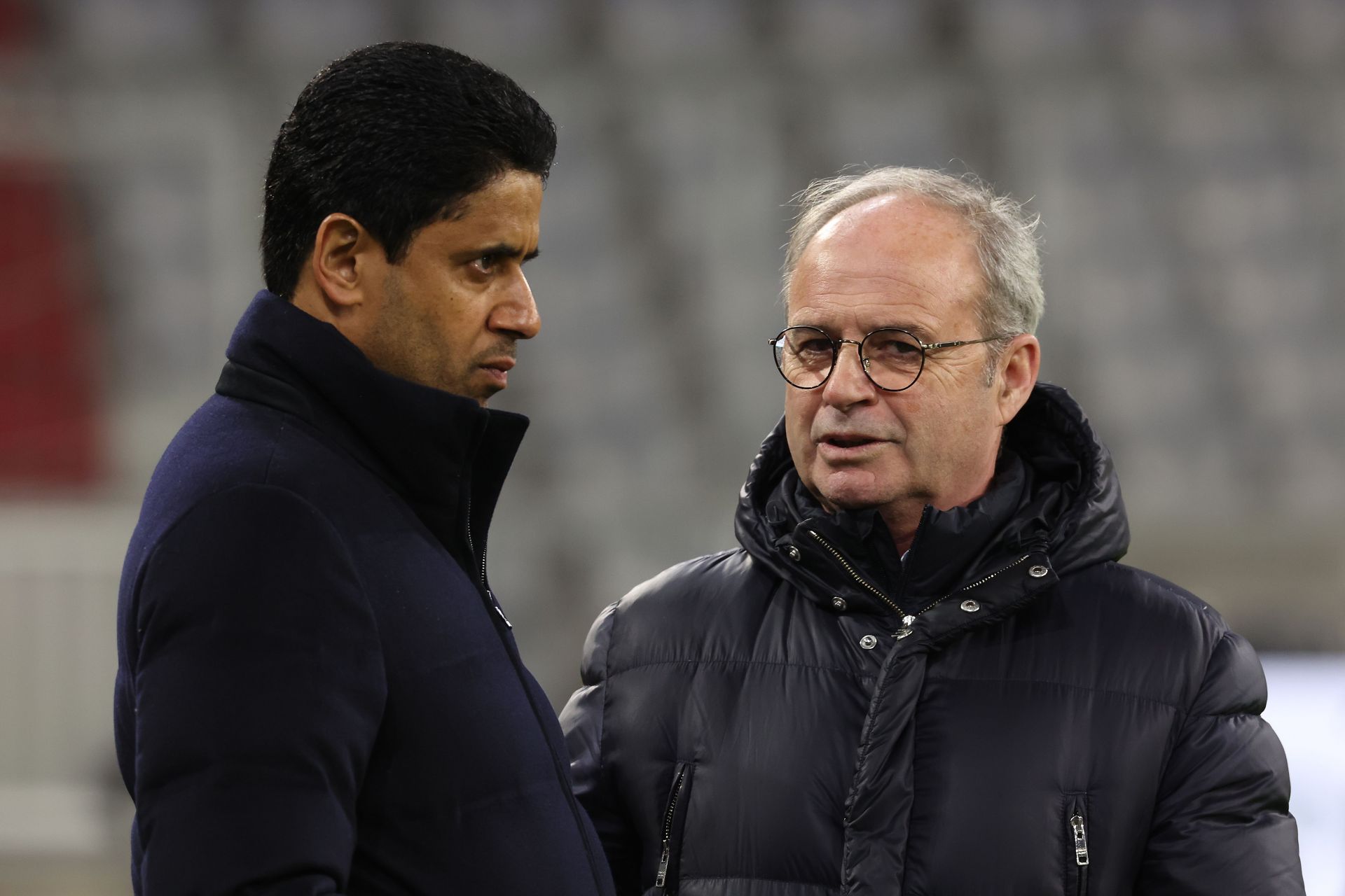 MUNICH, GERMANY - MARCH 07: Luís Campos (R), Sporting director of Paris Saint-Germain talks to Nasser Ghanim Al-Khelaifi, President of Paris Saint-Germain during a Paris Saint-Germain Training session ahead of their UEFA Champions League round of 16 match against FC Bayern München at Allianz Arena on March 07, 2023 in Munich, Germany.