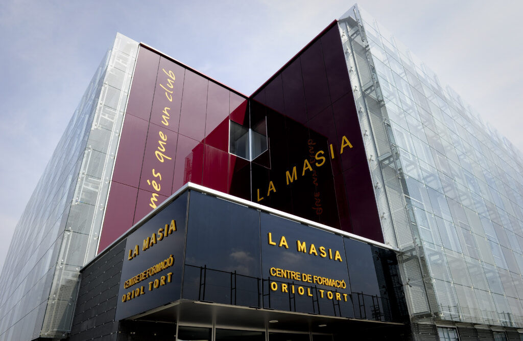 This picture shows the new building named "La Masia" training centre Oriol Tort where young players of the Barcelona football club live and train, near the Camp Nou stadium in Barcelona on August 5, 2011.