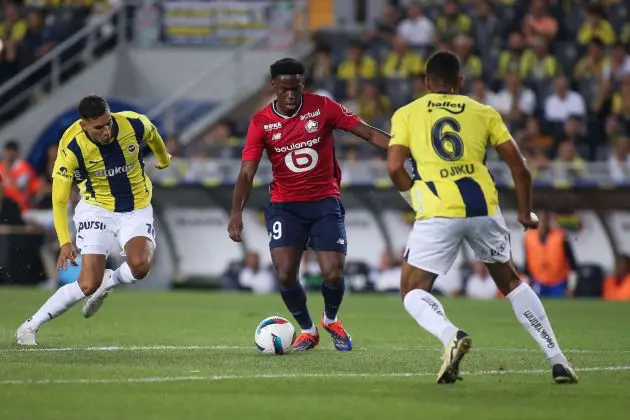 ISTANBUL, TURKEY - AUGUST 13: Jonathan David of Lille FC controls the ball during the UEFA Champions League Third Qualifying Round match between Fenerbahce and Lille FC at Ulker Stadium on August 13, 2024 in Istanbul, Turkey.