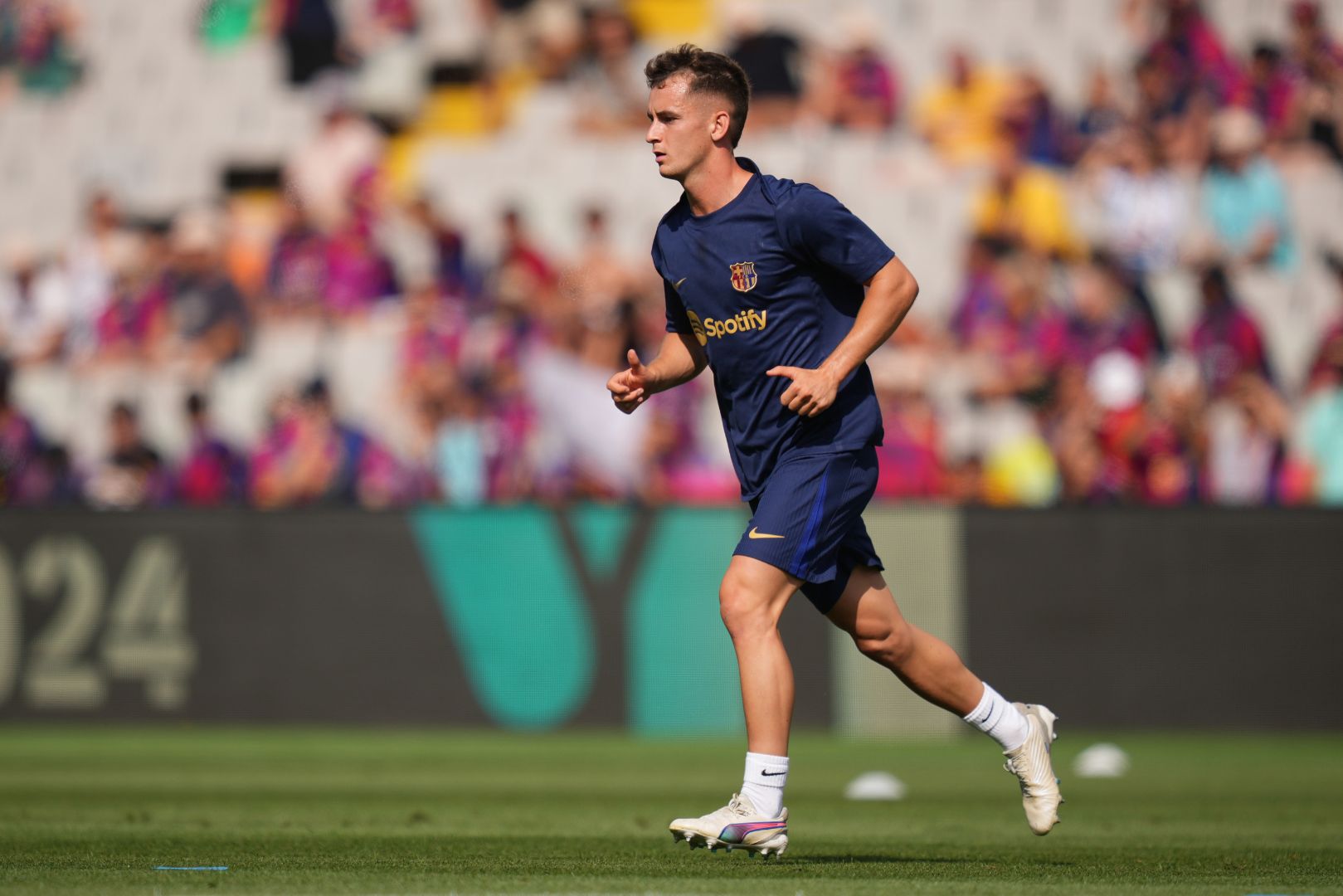 BARCELONA, SPAIN - AUGUST 31: Marc Casado of FC Barcelona warms up prior to the La Liga match between FC Barcelona and Real Valladolid CF at Camp Nou on August 31, 2024 in Barcelona, Spain.