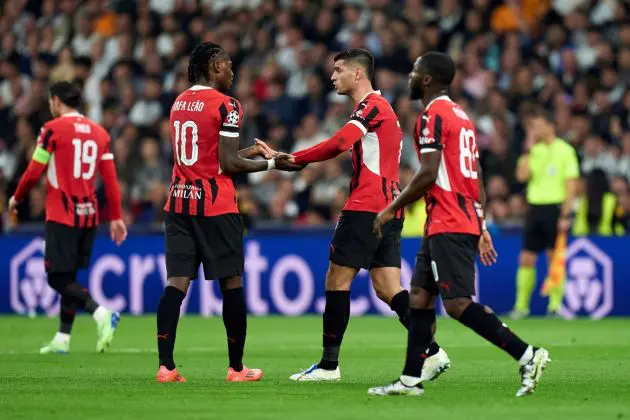 MADRID, SPAIN - NOVEMBER 05: Alvaro Morata of AC Milan celebrates with Rafael Leao scoring the team's second goal during the UEFA Champions League 2024/25 League Phase MD4 match between Real Madrid C.F. and AC Milan at Estadio Santiago Bernabeu on November 05, 2024 in Madrid, Spain.