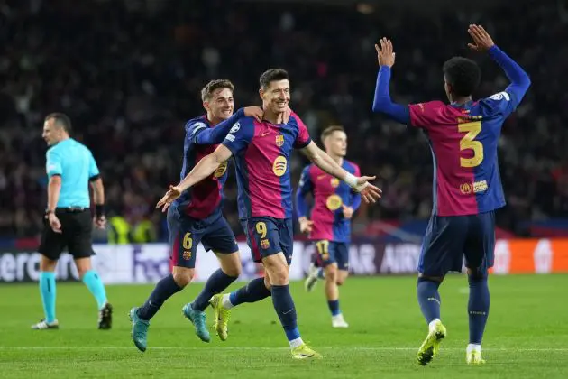 BARCELONA, SPAIN - NOVEMBER 26: Robert Lewandowski of FC Barcelona celebrates scoring his team's third goal with teammates during the UEFA Champions League 2024/25 League Phase MD5 match between FC Barcelona and Stade Brestois 29 at Estadi Olimpic Lluis Companys on November 26, 2024 in Barcelona, Spain.
