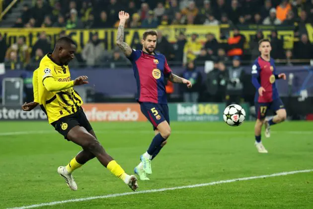 DORTMUND, GERMANY - DECEMBER 11: Serhou Guirassy of Borussia Dortmund scores a goal which was later ruled out during the UEFA Champions League 2024/25 League Phase MD6 match between Borussia Dortmund and FC Barcelona at BVB Stadion Dortmund on December 11, 2024 in Dortmund, Germany.