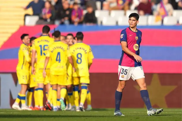 BARCELONA, SPAIN - NOVEMBER 30: Gerard Martin of FC Barcelona looks dejected after Sandro Ramirez of UD Las Palmas (not pictured) scores his team's first goal during the LaLiga match between FC Barcelona and UD Las Palmas at Estadi Olimpic Lluis Companys on November 30, 2024 in Barcelona, Spain.