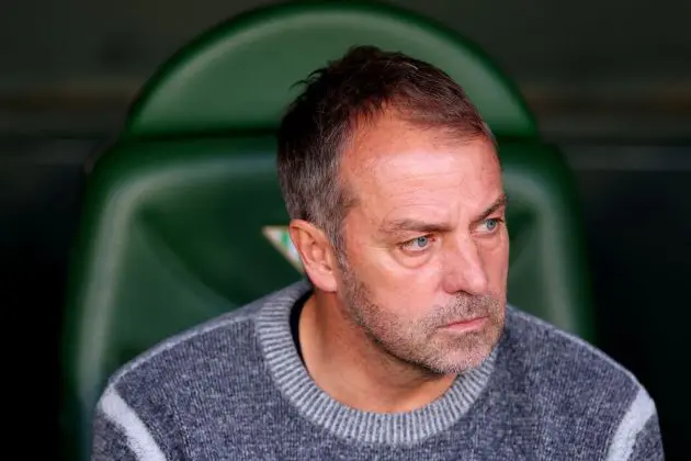 SEVILLE, SPAIN - DECEMBER 07: Hansi Flick, Head Coach of FC Barcelona, looks on prior to the LaLiga match between Real Betis Balompie and FC Barcelona at Estadio Benito Villamarin on December 07, 2024 in Seville, Spain.