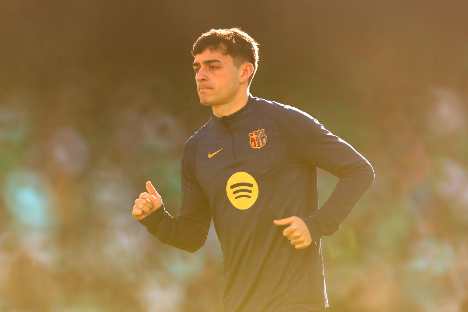 SEVILLE, SPAIN - DECEMBER 07: Pedri of FC Barcelona warms up prior to the LaLiga match between Real Betis Balompie and FC Barcelona at Estadio Benito Villamarin on December 07, 2024 in Seville, Spain.