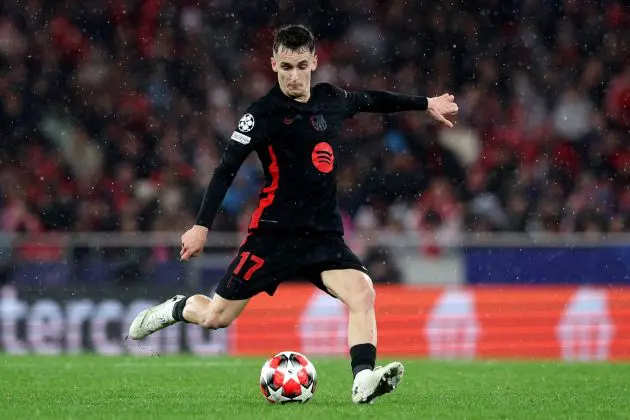LISBON, PORTUGAL - JANUARY 21: Marc Casado of FC Barcelona kicks the ball during the UEFA Champions League 2024/25 League Phase MD7 match between SL Benfica and FC Barcelona at Estadio do SL Benfica on January 21, 2025 in Lisbon, Portugal.