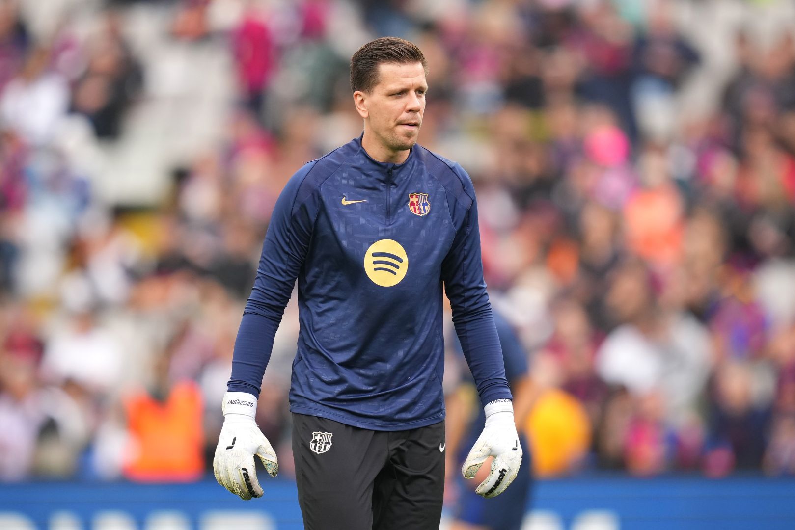 BARCELONA, SPAIN - NOVEMBER 03: Wojciech Szczesny of FC Barcelona looks on as he warms up prior to the La Liga EA Sports match between FC Barcelona and RCD Espanyol at Estadi Olimpic Lluis Companys on November 03, 2024 in Barcelona, Spain.