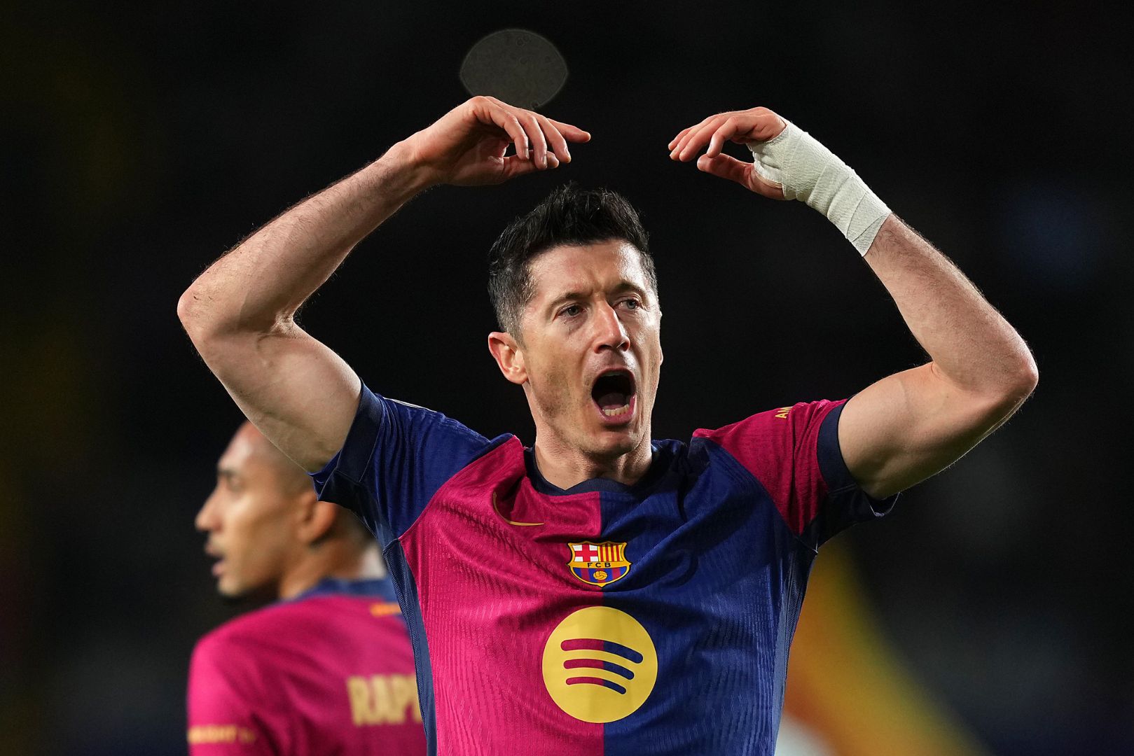 BARCELONA, SPAIN - FEBRUARY 25: Robert Lewandowski of FC Barcelona celebrates scoring his team's fourth goal during the Copa del Rey Semi Final match between FC Barcelona and Atletico de Madrid at Estadi Olimpic Lluis Companys on February 25, 2025 in Barcelona, Spain.