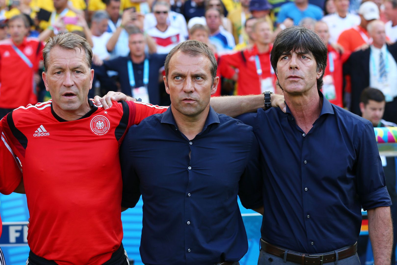 RIO DE JANEIRO, BRAZIL - JULY 04: (L-R) Goalkeeper coach Andreas Koepke, assistant coach Hansi Flick and head coach Joachim Loew of Germany look on prior to the 2014 FIFA World Cup Brazil Quarter Final match between France and Germany at Maracana on July 4, 2014 in Rio de Janeiro, Brazil.