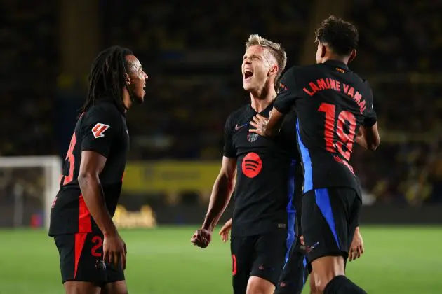 LAS PALMAS, SPAIN - FEBRUARY 22: Dani Olmo of FC Barcelona celebrates with his team mates Jules Kounde and Lamine Yamal after scoring his team's first goal during the LaLiga match between UD Las Palmas and FC Barcelona at Estadio Gran Canaria on February 22, 2025 in Las Palmas, Spain.