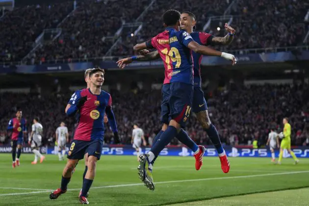 BARCELONA, SPAIN - MARCH 11: Raphinha of FC Barcelona celebrates scoring his team's first goal with teammate Lamine Yamal during the UEFA Champions League 2024/25 UEFA Champions League 2024/25 Round of 16 Second Leg match between FC Barcelona and SL Benfica at Estadi Olímpic Lluís Companys on March 11, 2025 in Barcelona, Spain.