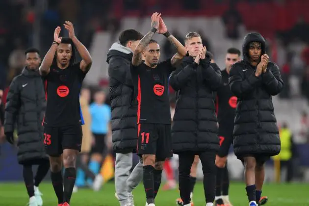 LISBON, PORTUGAL - MARCH 05: Raphinha of FC Barcelona acknowledges the fans with teammates Jules Kounde, Frenkie de Jong and Lamine Yamal after the UEFA Champions League 2024/25 Round of 16 first Leg match between SL Benfica and FC Barcelona at Estadio da Luz on March 05, 2025 in Lisbon, Portugal.