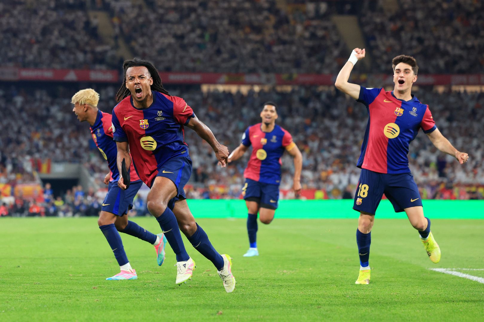 SEVILLE, SPAIN - APRIL 26: Jules Kounde of FC Barcelona scores his team's third goal during the Copa del Rey Final match between FC Barcelona and Real Madrid at Estadio de La Cartuja on April 26, 2025 in Seville, Spain.