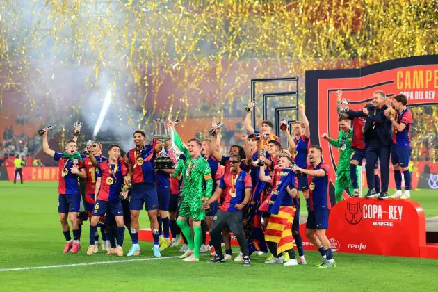 SEVILLE, SPAIN - APRIL 26: Ronald Araujo and Marc-Andre ter Stegen of FC Barcelona lift the Copa del Rey trophy after the team's victory in the Copa del Rey Final match between FC Barcelona and Real Madrid at Estadio de La Cartuja on April 26, 2025 in Seville, Spain.