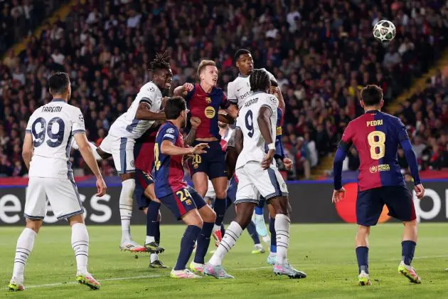 BARCELONA, SPAIN - APRIL 30: Denzel Dumfries of FC Internazionale scores his team's third goal whilst under pressure from Dani Olmo of FC Barcelona during the UEFA Champions League 2024/25 Semi Final First Leg match between FC Barcelona and FC Internazionale Milano at Estadi Olimpic Lluis Companys on April 30, 2025 in Barcelona, Spain.