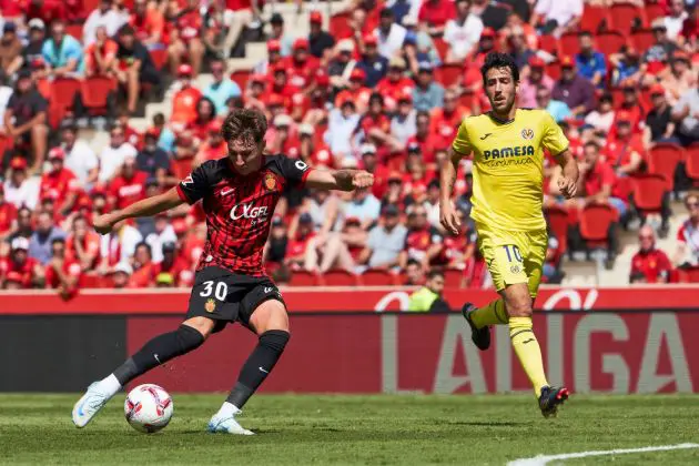 MALLORCA, SPAIN - SEPTEMBER 14: Marc Domenech of RCD Mallorca shoots the ball during the LaLiga match between RCD Mallorca and Villarreal CF at Estadi de Son Moix on September 14, 2024 in Mallorca, Spain.
