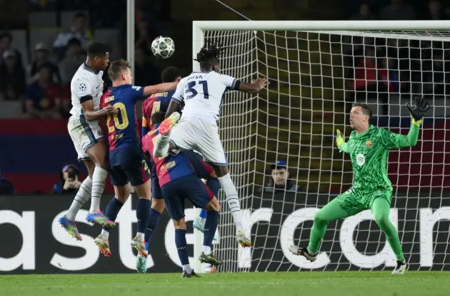 BARCELONA, SPAIN - APRIL 30: Denzel Dumfries of FC Internazionale scores his team's third goal past Wojciech Szczesny of FC Barcelona during the UEFA Champions League 2024/25 Semi Final First Leg match between FC Barcelona and FC Internazionale Milano at Estadi Olimpic Lluis Companys on April 30, 2025 in Barcelona, Spain.