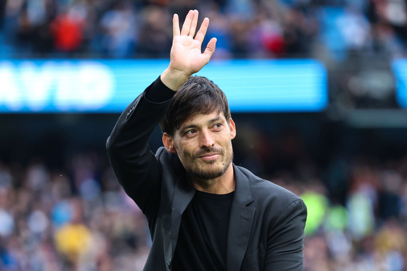 MANCHESTER, ENGLAND - MAY 04: David Silva waves to the fans prior to the Premier League match between Manchester City and Wolverhampton Wanderers at Etihad Stadium on May 04, 2024 in Manchester, England.