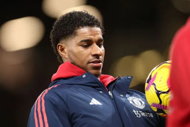 MANCHESTER, ENGLAND - DECEMBER 30: Marcus Rashford of Manchester United warms up prior to the Premier League match between Manchester United FC and Newcastle United FC at Old Trafford on December 30, 2024 in Manchester, England.