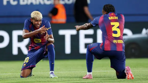 Lamine Yamal of FC Barcelona celebrates scoring his team's fifth goal with teammate Alejandro Balde during the Joan Gamper Trophy match between FC Barcelona and Como1907 at Estadi Johan Cruyff.