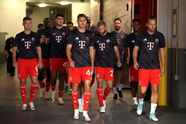 ATLANTA, GEORGIA - JULY 05: Josip Stanisic #44 and Harry Kane #9 of FC Bayern Munchen walk to the pitch to warm up prior to the FIFA Club World Cup 2025 quarter-final match between Paris Saint-Germain and FC Bayern München at Mercedes-Benz Stadium on July 05, 2025 in Atlanta, Georgia.