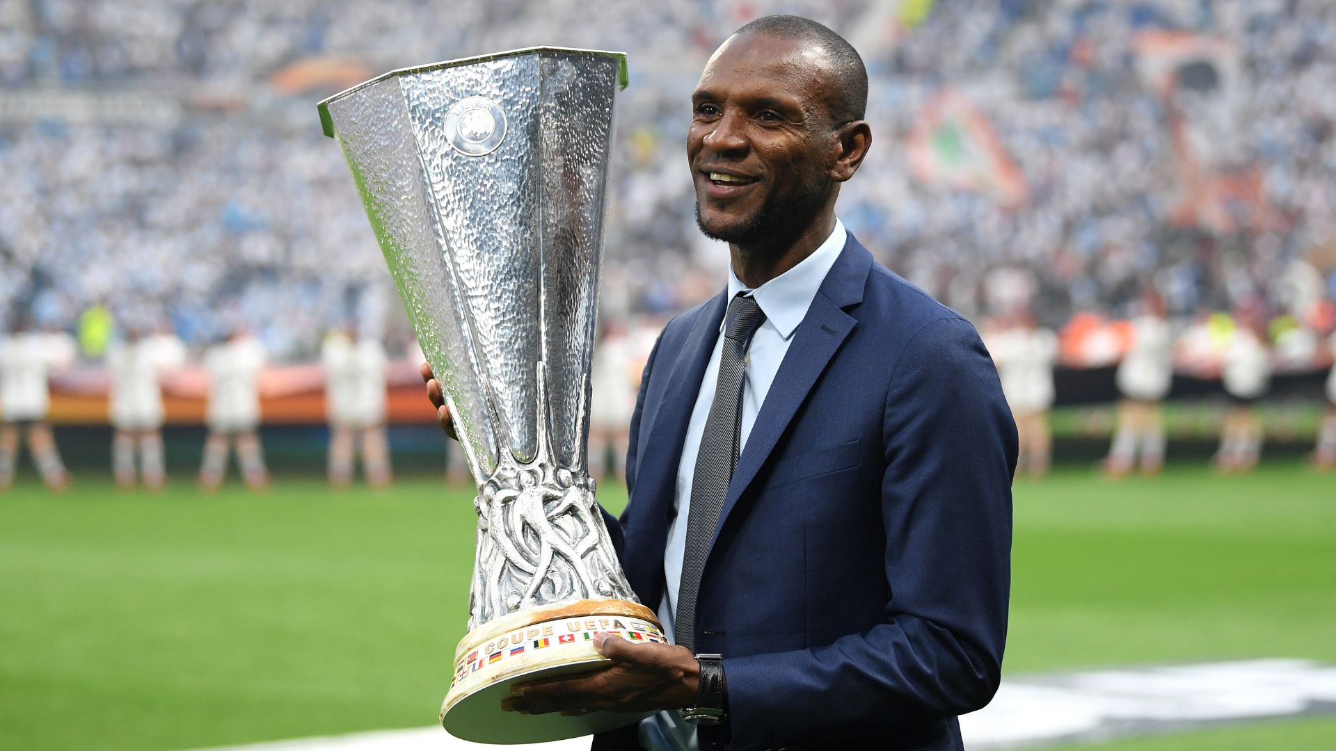 LYON, FRANCE - MAY 16: Eric Abidal walks out with the trophy ahead of the UEFA Europa League Final between Olympique de Marseille and Club Atletico de Madrid at Stade de Lyon on May 16, 2018 in Lyon, France.
