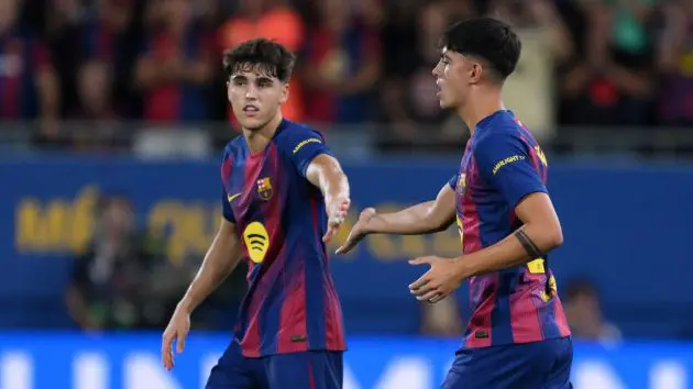 BARCELONA, SPAIN - SEPTEMBER 14: Marc Bernal of FC Barcelona greets teammate Pau Cubarsi as he enters the pitch in a substitution during the LaLiga EA Sports match between FC Barcelona and Valencia CF at Estadi Johan Cruyff on September 14, 2025 in Barcelona, Spain.