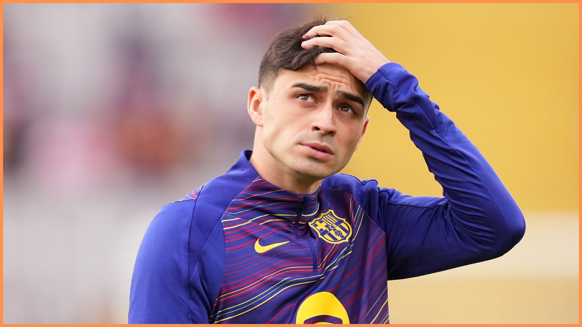 Pedri of FC Barcelona looks on during the warm up prior to the LaLiga EA Sports match between FC Barcelona and Real Sociedad at Estadi Olimpic Lluis Companys.