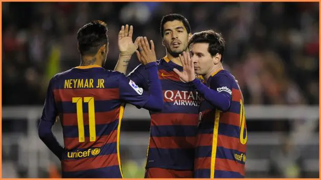 Lionel Messi of FC Barcelona celebrates with Neymar and Luis Suarez after scoring his 2nd goal during the La Liga match between Rayo Vallecano and FC Barcelona at Estadio de Vallecas.