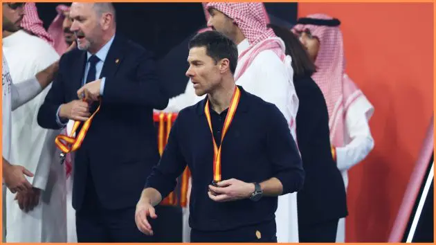 JEDDAH, SAUDI ARABIA - JANUARY 11: Xabi Alonso, Head Coach of Real Madrid, walks with their runners up medal around their neck following their side's loss in the Spanish Super Cup Final between FC Barcelona and Real Madrid at King Abdullah Sports City Hall Stadium on January 11, 2026 in Jeddah, Saudi Arabia.