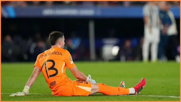 BARCELONA, SPAIN - MARCH 18: Joan Garcia of FC Barcelona holds his knee with an injury during the UEFA Champions League 2025/26 Round of 16 Second Leg match between FC Barcelona and Newcastle United FC at Camp Nou on March 18, 2026 in Barcelona, Spain.