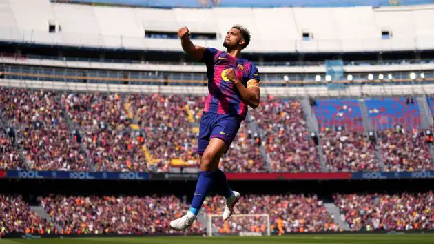 BARCELONA, SPAIN - MARCH 22: Ronald Araujo of FC Barcelona celebrates scoring his team's first goal during the LaLiga EA Sports match between FC Barcelona and Rayo Vallecano de Madrid at Spotify Camp Nou on March 22, 2026 in Barcelona, Spain.