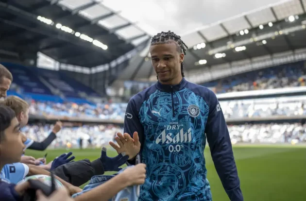Nathan Ake of Manchester City greets fans following his warm up ahead of kick-off during the Premier League match between Manchester City and Arsenal at the Etihad Stadium, Manchester, England. Sunday 19th April 2026.