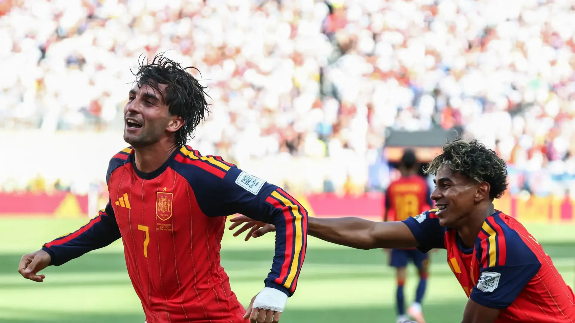 Ferran Torres celebrating in a red Spain national team jersey during a match