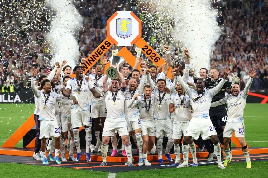 Aston Villa players celebrating with the Europa League trophy and winners' podium in 2026