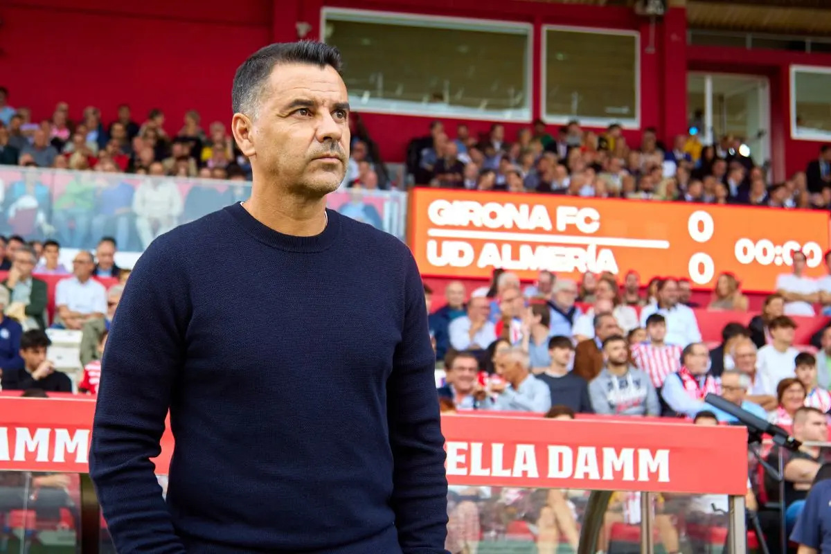 Football manager Míchel Sánchez standing on the sideline during a match between Girona FC and UD Almería