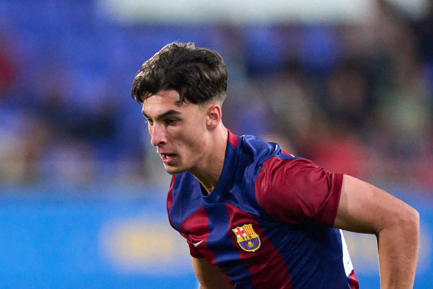 Close-up of Guille Fernandez in an FC Barcelona Atletic home kit during a match